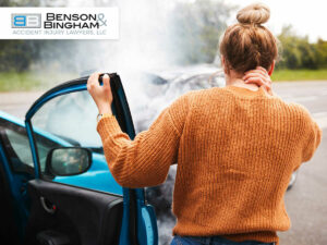 Woman with pain neck after a car accident